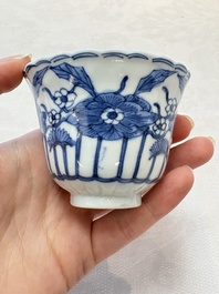 A set of six Chinese blue and white cups and saucers with floral design, Kangxi mark, 19th C.