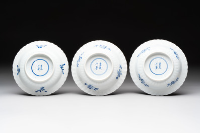 A set of six Chinese blue and white cups and saucers with floral design, Kangxi mark, 19th C.