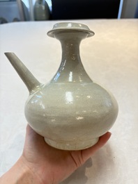 A Chinese crackle-glazed vase and a cream-glazed kendi, Tang/Song