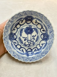A set of six Chinese blue and white cups and saucers with floral design, Kangxi mark, 19th C.