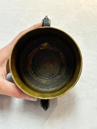 A Chinese archaistic bronze censer with a wooden cover, Xuande mark, 19th C.