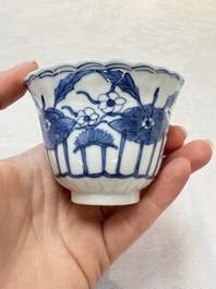A set of six Chinese blue and white cups and saucers with floral design, Kangxi mark, 19th C.