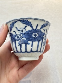 A set of six Chinese blue and white cups and saucers with floral design, Kangxi mark, 19th C.