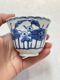 A set of six Chinese blue and white cups and saucers with floral design, Kangxi mark, 19th C.