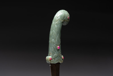 A fine Mughal dagger with a ruby- and gold-inlaid celadon jade hilt, 18th C.