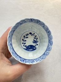 A set of six Chinese blue and white cups and saucers with floral design, Kangxi mark, 19th C.