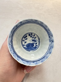 A set of six Chinese blue and white cups and saucers with floral design, Kangxi mark, 19th C.