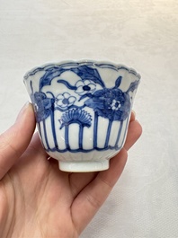 A set of six Chinese blue and white cups and saucers with floral design, Kangxi mark, 19th C.