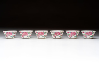 A set of six Chinese famille rose 'peonies' cups and saucers, Yongzheng/Qianlong