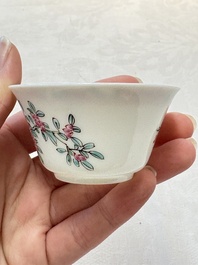 A set of six Chinese famille rose 'peonies' cups and saucers, Yongzheng/Qianlong