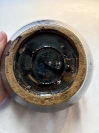 A Chinese Jizhou tortoiseshell-glazed tea bowl, a ewer and a black-glazed vase, Jin and later