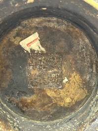 A Chinese archaistic bronze censer with a wooden cover, Xuande mark, 19th C.