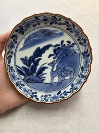 A Japanese blue and white 'rabbit' cup and a 'deer' plate, Edo, 17th C.