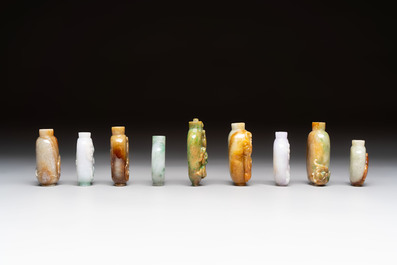 A group of nine Chinese jadeite snuff bottles, 20th C.