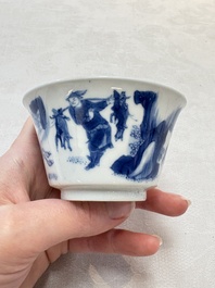 A Chinese blue and white 'Mongolian hunting' cup and saucer, jade mark, Kangxi