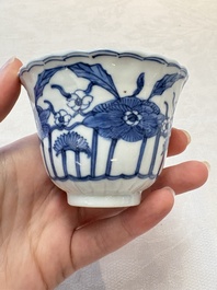 A set of six Chinese blue and white cups and saucers with floral design, Kangxi mark, 19th C.