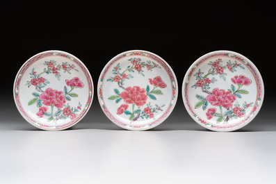 A set of six Chinese famille rose 'peonies' cups and saucers, Yongzheng/Qianlong