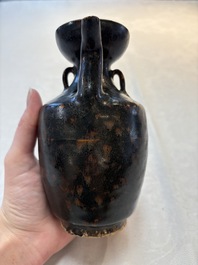 A Chinese Jizhou tortoiseshell-glazed tea bowl, a ewer and a black-glazed vase, Jin and later