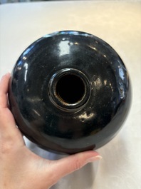 A Chinese Jizhou tortoiseshell-glazed tea bowl, a ewer and a black-glazed vase, Jin and later