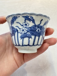 A set of six Chinese blue and white cups and saucers with floral design, Kangxi mark, 19th C.