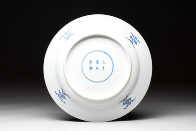 A Chinese blue and white dish with floral design, Kangxi mark, 19th C.