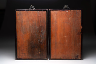 Two Chinese polychrome 'peacock' and 'rooster' plaques with wooden frames, 20th C.