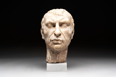 An Italian Grand Tour marble sculpture of a man's head in Roman style, probably after a bust of Caesar, 19th C.