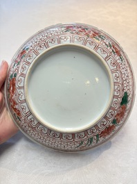 A Chinese wucai plate with floral design, Kangxi