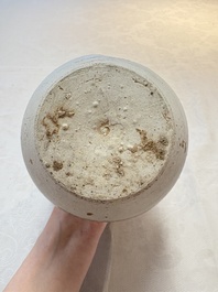 A Chinese crackle-glazed vase and a cream-glazed kendi, Tang/Song