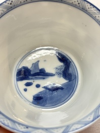 A Chinese blue and white 'Mongolian hunting' cup and saucer, jade mark, Kangxi
