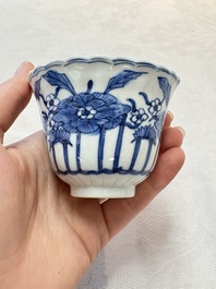 A set of six Chinese blue and white cups and saucers with floral design, Kangxi mark, 19th C.