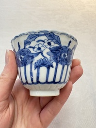 A set of six Chinese blue and white cups and saucers with floral design, Kangxi mark, 19th C.