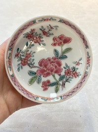 A set of six Chinese famille rose 'peonies' cups and saucers, Yongzheng/Qianlong