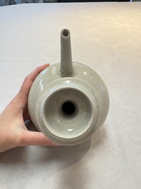 A Chinese crackle-glazed vase and a cream-glazed kendi, Tang/Song
