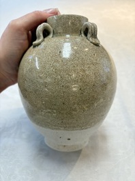 A Chinese crackle-glazed vase and a cream-glazed kendi, Tang/Song