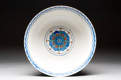 A large polychrome Iznik-style 'peacocks' bowl on a wooden stand, Samson, Paris, 19th C.