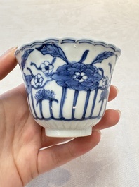 A set of six Chinese blue and white cups and saucers with floral design, Kangxi mark, 19th C.