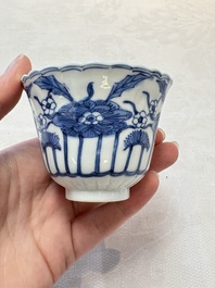 A set of six Chinese blue and white cups and saucers with floral design, Kangxi mark, 19th C.