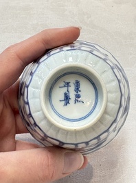 A set of six Chinese blue and white cups and saucers with floral design, Kangxi mark, 19th C.