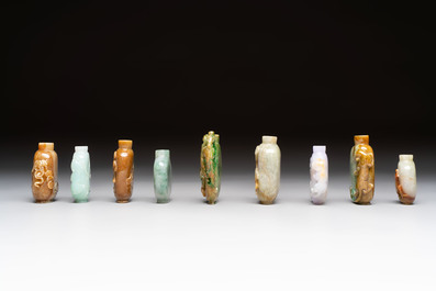 A group of nine Chinese jadeite snuff bottles, 20th C.