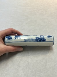 A Chinese blue and white wrist rest with figural design, 19th C.