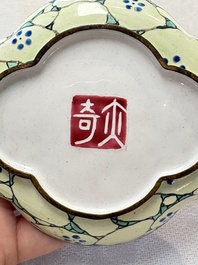 A pair of Chinese Canton enamel quadrifoil 'river landscape' saucers, Yi Qi 亦奇 mark, 18th C.