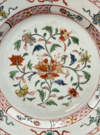 A Chinese Imari-style 'lady and boys' plate and a famille verte 'lotus' plate, Kangxi/Yongzheng