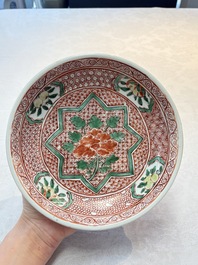 A Chinese wucai plate with floral design, Kangxi