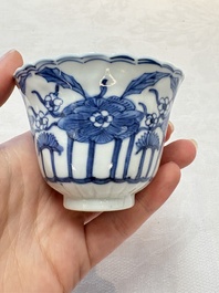 A set of six Chinese blue and white cups and saucers with floral design, Kangxi mark, 19th C.