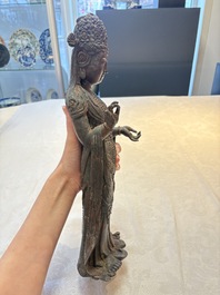 A fine and large Chinese bronze standing Buddha, possibly Liao