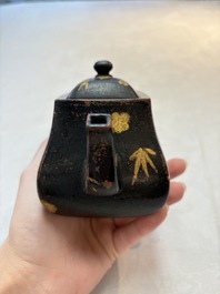 A Chinese gilt and black-lacquered Yixing teapot and cover, Qianlong mark and of the period