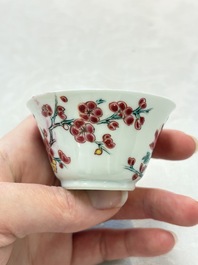 Two Chinese famille rose cups and saucers with birds and flowering branches, Yongzheng