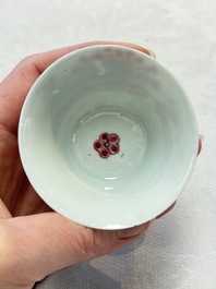 Two Chinese famille rose cups and saucers with birds and flowering branches, Yongzheng