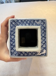 A pair of Chinese blue and white square flasks and covers with narrative design, Kangxi